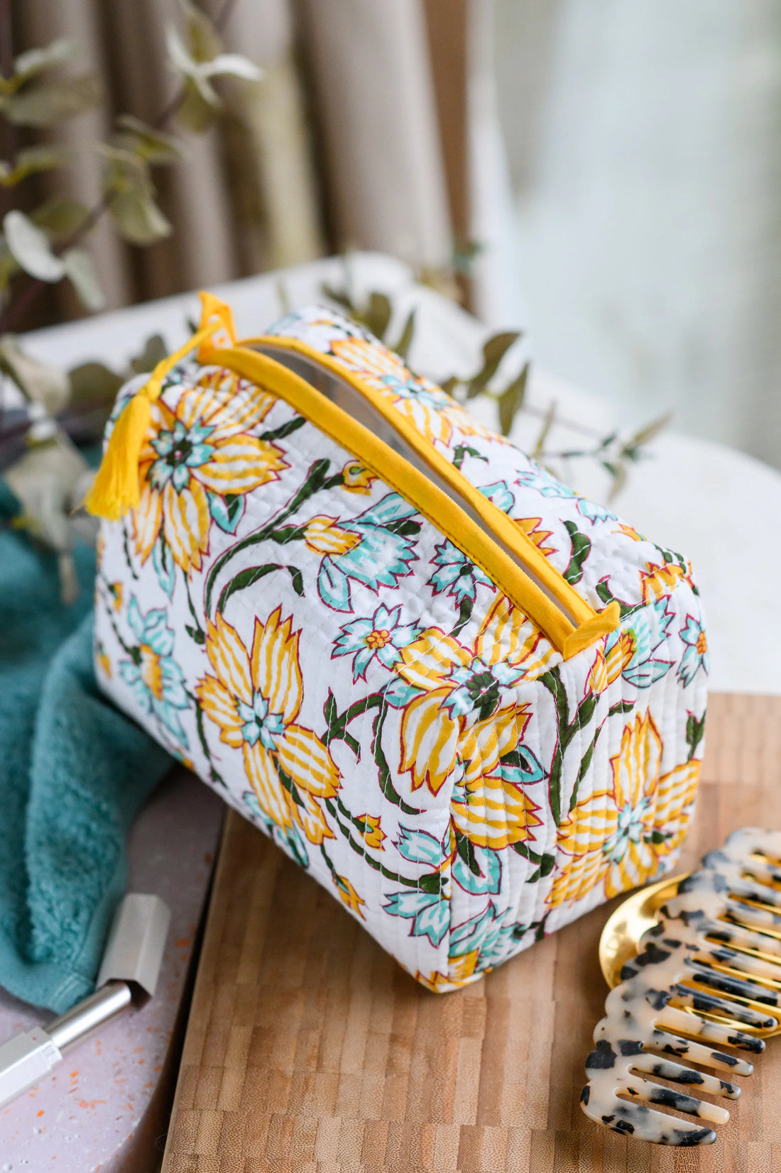 Champa Flower Quilted Wash Bag